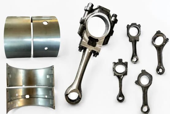 Forged connecting rods including EMD blade and fork rod design