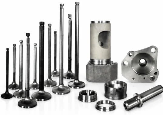 Engine valve spindles, valve seats, and valve guides for EMD and D49 engines