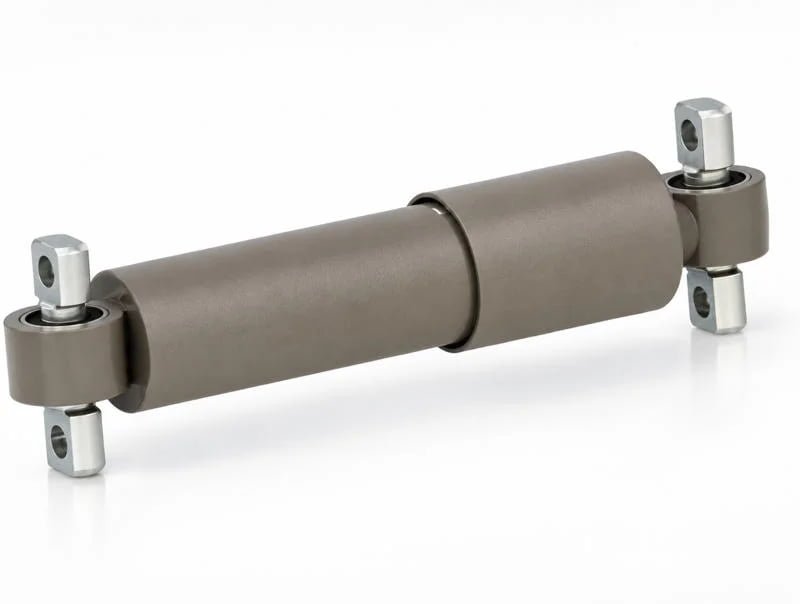 Exploded view of small rubber bushings and joints at both ends of a hydraulic shock absorber