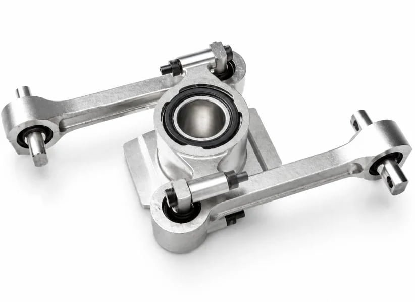 Railway traction rod assembly with elastic rubber bushes pressed into both rod ends